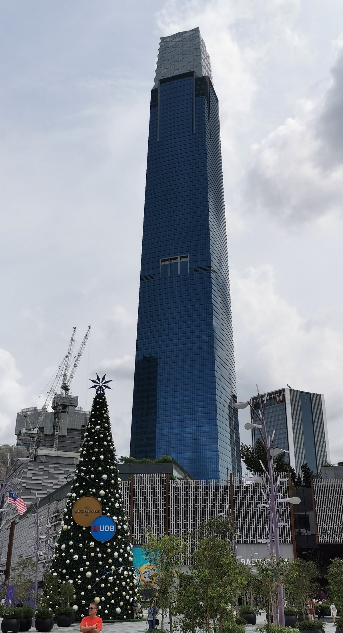 The Exchange 106 skyscraper in Kuala Lumpur with UOB Christmas tree in the background on December 16, 2023