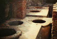 Thermopolium (VI.8.8) in Pompeii ancient ruins