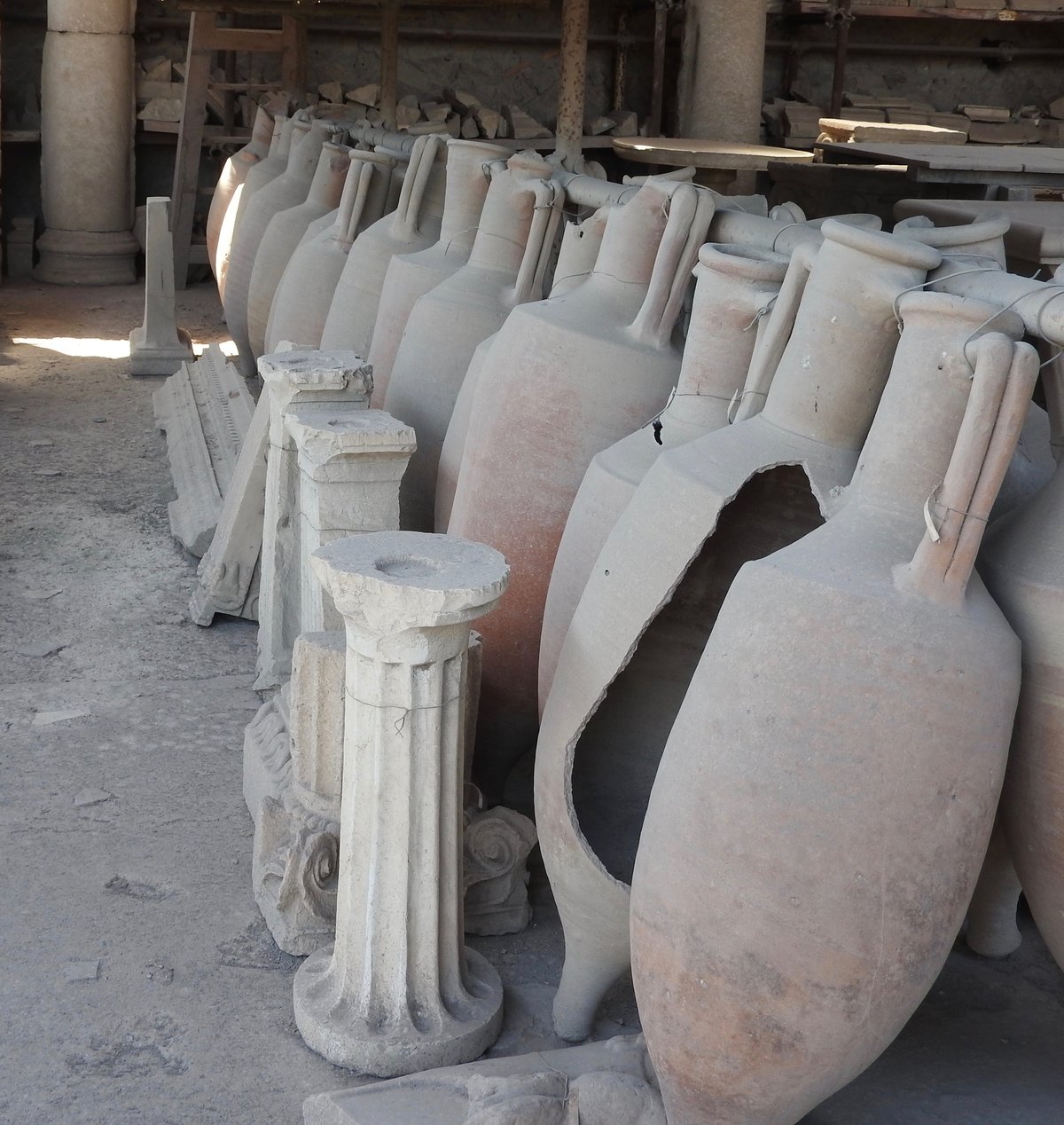 Ancient amphorae displayed in Pompeii archaeological site