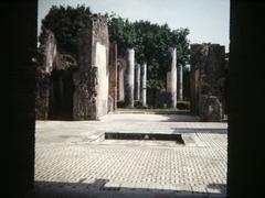 Ancient Roman house ruins with frescoes in Pompeii, Italy