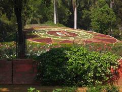 Sayaji Baug Floral Clock with flowers and green surroundings