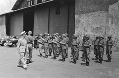 General H.J. Kruls inspecting honor guard at Kemajoran airport arrival in Batavia, May 1, 1947, Indonesia