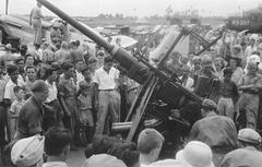 Crowd gathered around anti-aircraft gun at Kemajoran airfield, Batavia, Indonesia, March 9, 1947