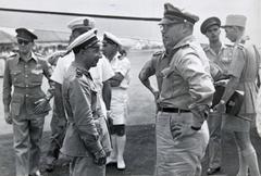 Brigadier-General Bodet arriving at Kemajoran, Batavia, with his C-47 Dakota aircraft, greeted by military officials, 1945-1950