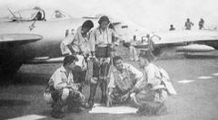 Daniel Maukar standing in the middle discussing with fellow pilots at Kemayoran airfield Jakarta
