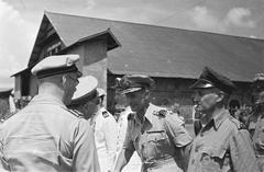 General H.J. Kruls shaking hands with General Buurman van Vreeden at Kemajoraan airfield in Batavia, Indonesia, 1947