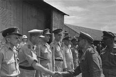General H.J. Kruls shaking hands with General Dürst Britt at Kemajoraan airfield in Batavia, Indonesia on May 1, 1947