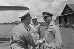 General H.J. Kruls shaking hands with Lieutenant General S.H. Spoor at Kemajoran Airport, Batavia, Indonesia, on May 1, 1947