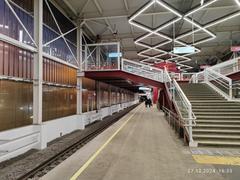 Entrance pathway to Prokshino station in Moscow metro with modern glass structures