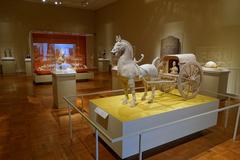 Interior view of Portland Art Museum with artwork displays and visitors in Portland Oregon