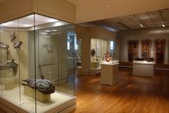 Interior view of Portland Art Museum in Portland Oregon featuring art exhibits and visitors