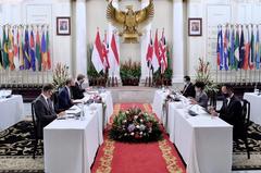 Indonesian Foreign Minister Retno Marsudi welcoming UK Foreign Secretary Dominic Raab at Indonesian Ministry of Foreign Affairs