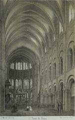 Interior view of Saint Remi Basilica choir in Reims with detailed stone arches and wooden choir stalls
