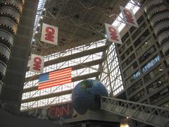 Interior view of CNN Center with large digital display and food court area
