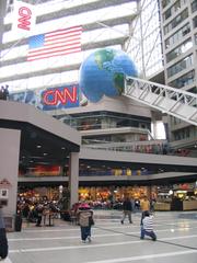 Interior view of CNN Center with modern architecture and large digital screens in Atlanta