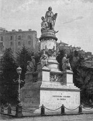 Columbus Monument in Genoa with intricate sculptures on stone pedestal
