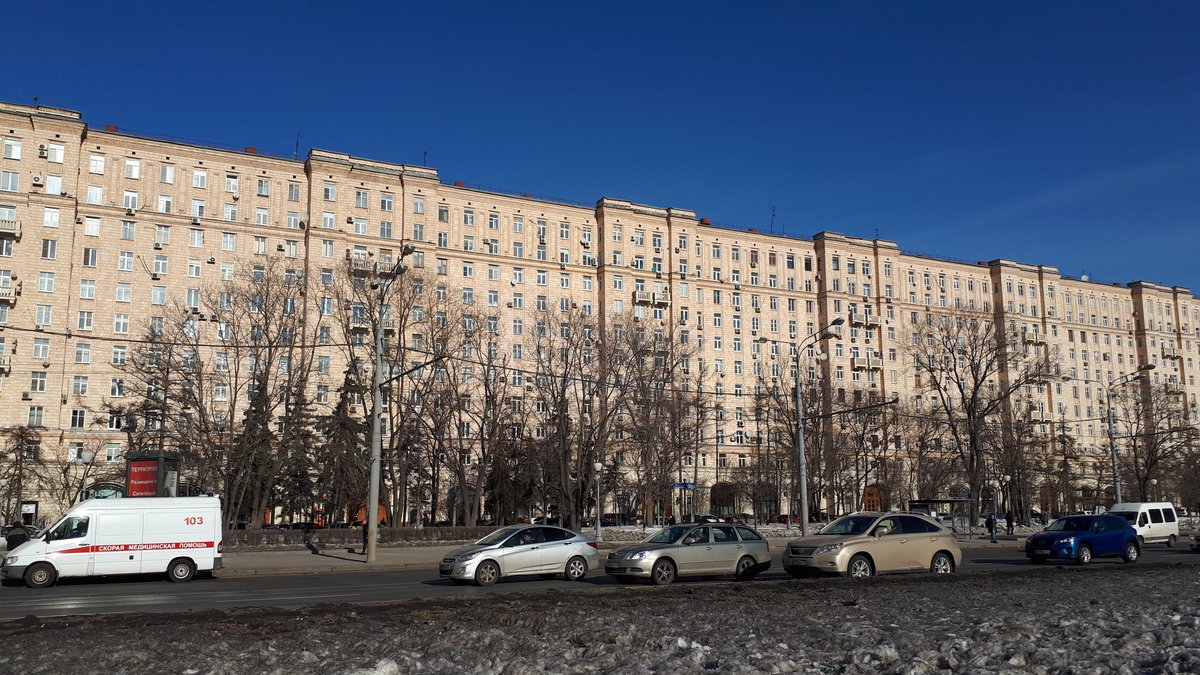 February 2019 snowy winter scene in Moscow with people walking and historic buildings