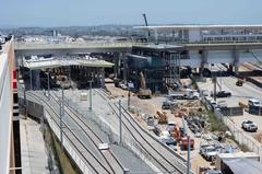 LAX Metro Transit Center station construction site with cranes and building framework in July 2023