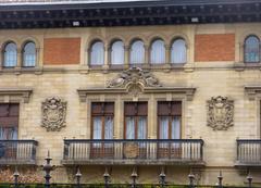Palacio de Ajuria Enea in Vitoria-Gasteiz surrounded by trees and blue sky