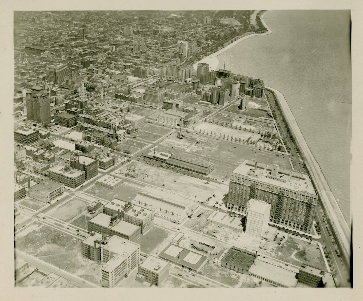 Aerial view of Chicago cityscape showing buildings and streets from above during 1925