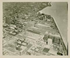 Aerial view of Chicago cityscape showing buildings and streets from above during 1925