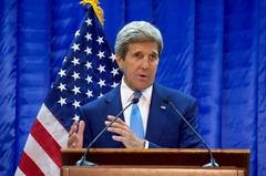 U.S. Secretary of State John Kerry addresses reporters at the U.S. Embassy in Baghdad