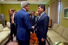 U.S. Secretary of State John Kerry shaking hands with Kurdistan Regional Government Prime Minister Nechirvan Barzani at U.S. Embassy in Baghdad