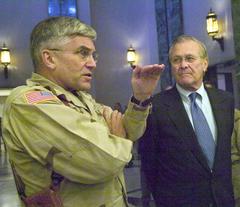 U.S. Army Gen. George Casey and Secretary of Defense Donald Rumsfeld at press conference in Baghdad 2005