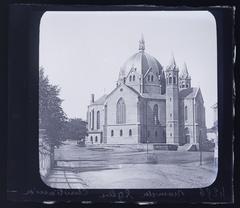 Historic church with dome and spire facade in Oslo, Norway