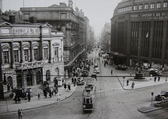 Aleksanterinkatu street view from 1949-1950 with historical buildings and vintage cars