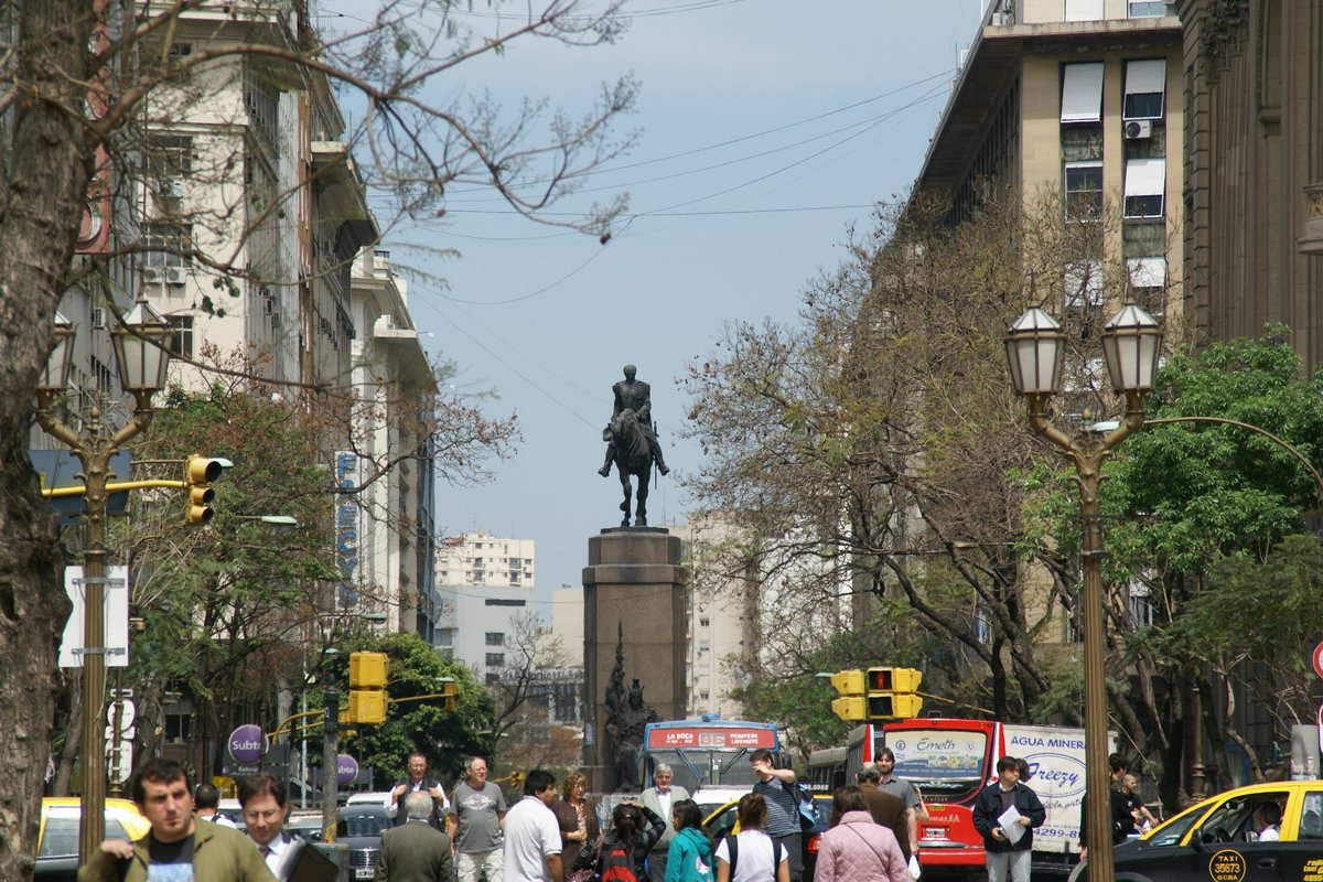 Avenida Presidente Julio A. Roca street view in Buenos Aires with tall buildings and city traffic