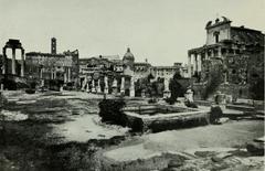 Historical black and white photograph of angel statues in Rome