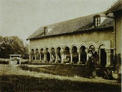 Ruins of Bassefontaine Abbey with old stone structures and greenery
