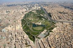Al Azhar Park with greenery and historic mosque in Cairo, Egypt