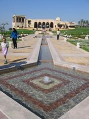 Azhar Park with lush greenery and city buildings in the background