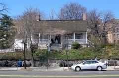 Dyckman House viewed from across Broadway on a sunny midday