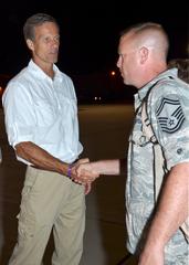 South Dakota Senator John Thune welcoming home U.S. Air Force Senior Master Sgt. Christopher Novak at Joe Foss Field