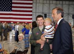 U.S. Sen. John Thune thanking U.S. Air Force Capt. Casey Minor and family at Joe Foss Field May 2015