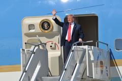 U.S. President Donald Trump waving while exiting Air Force One at Joe Foss Field Sioux Falls South Dakota September 2018