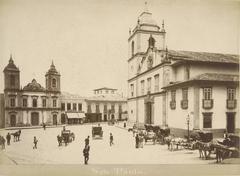 Black and white historical photograph of the Rio de Janeiro harbor with ships and city buildings