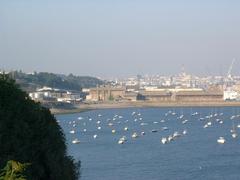 Aerial view of Rade de Brest harbor with ships and surrounding landscape