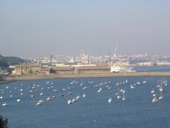 Aerial view of Rade de Brest, a large natural harbor in Brest, France, showing calm waters and surrounding peninsula