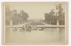 Statue of Apollo with fountain in the Bassin d'Apollon at the park of Versailles, Chateau de Versailles