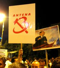 Protest against President Băsescu's impeachment in Victoriei Square, Bucharest with satirical placards mocking Antena 3 and Victor Ponta