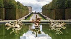 Scenic view of the Park of Versailles with lush greenery and clear sky