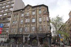 Panoramic view of Student Square in Belgrade with historic buildings and people