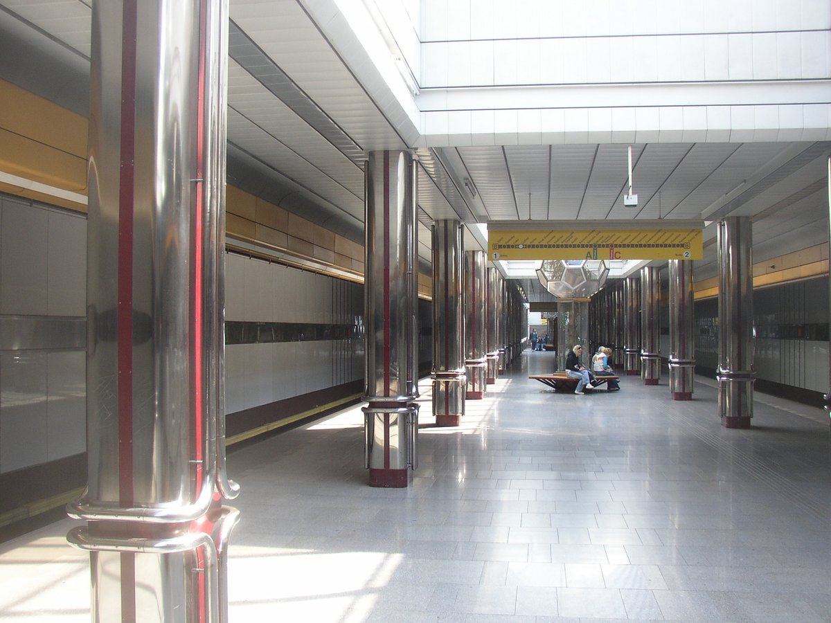 Lužiny metro station platform and tracks in Prague with modern design and yellow supporting beams
