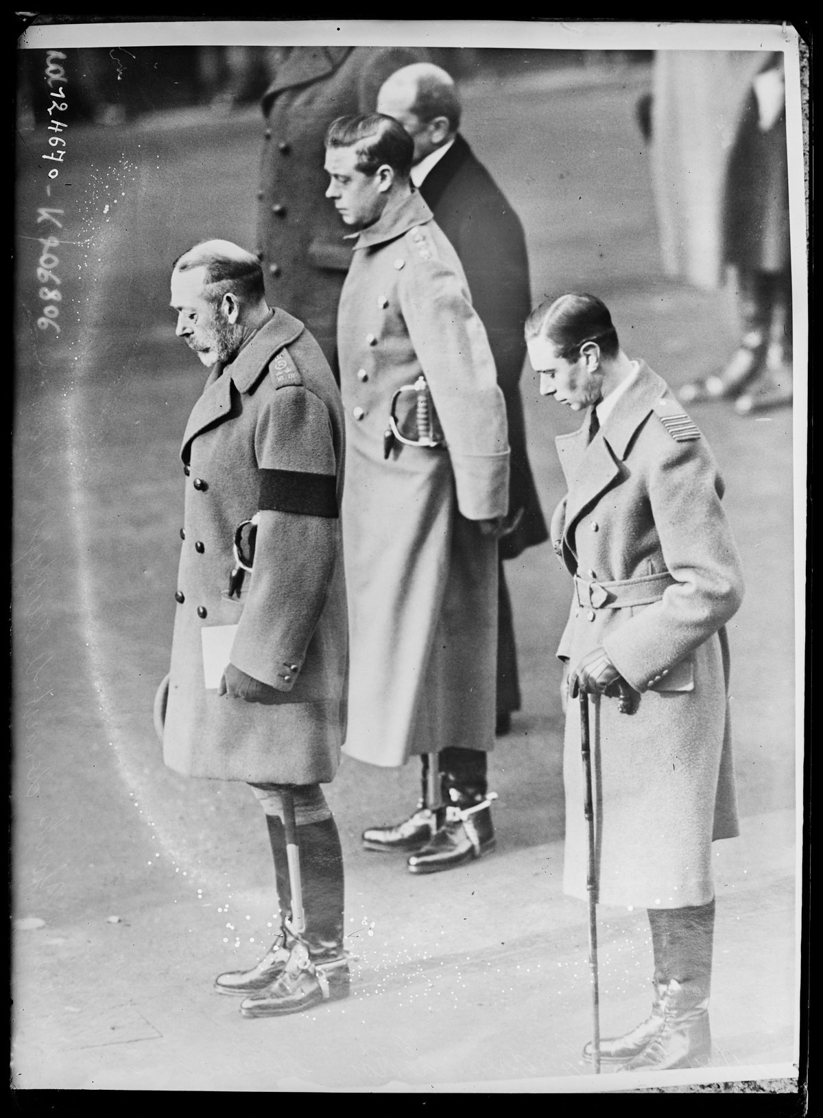 King George V, King Edward VIII, and King George VI of Great Britain standing in front of the Cenotaph in London during a World War I remembrance event