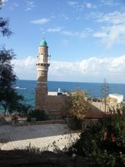 Sea Mosque Al-Bahr in Jaffa with blue sky and historic architecture