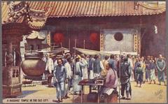 Buddhist temple in the old city of Shanghai with traditional architecture and incense smoke